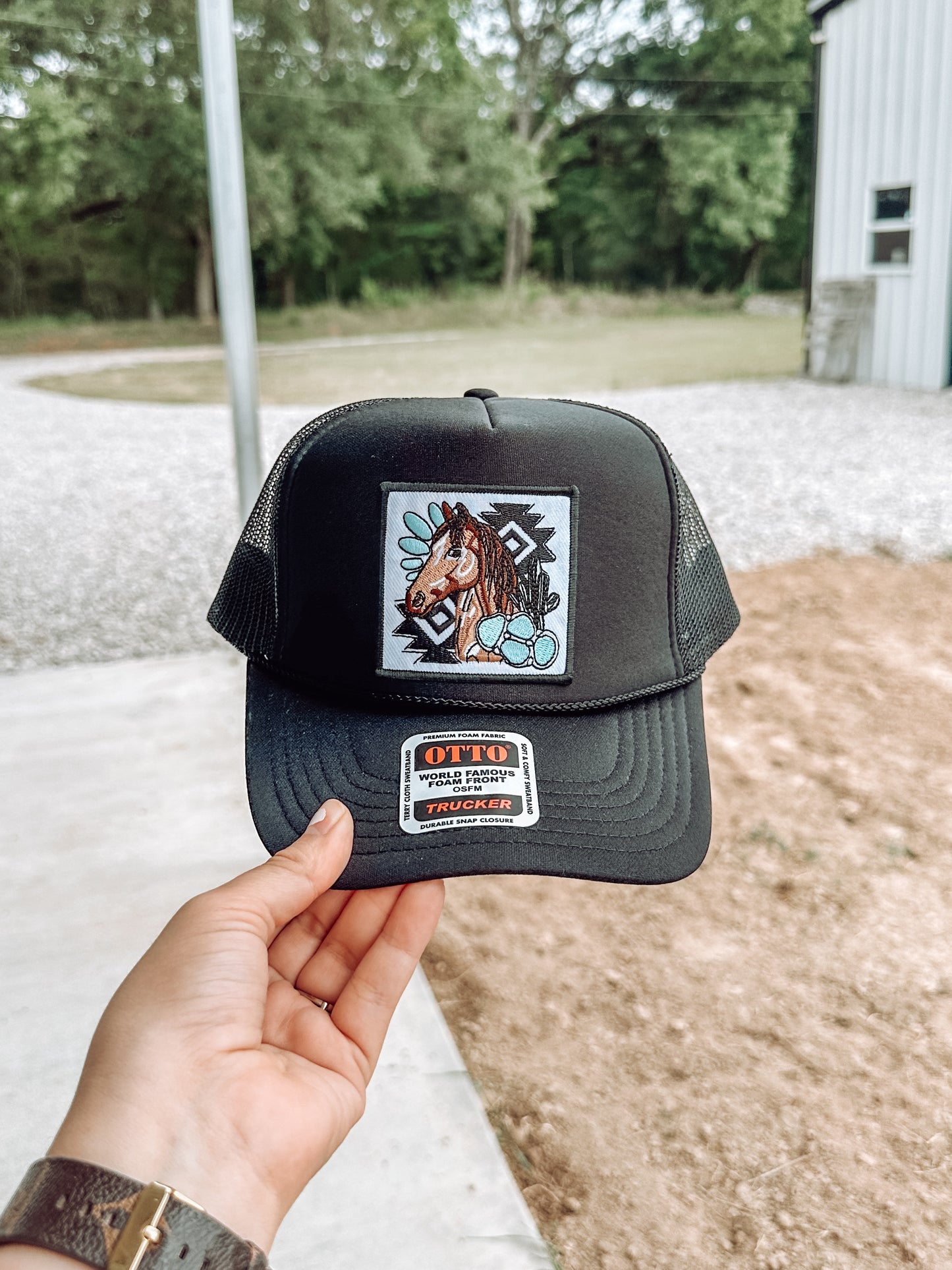 Turquoise Horse Patch Trucker Hat in Black