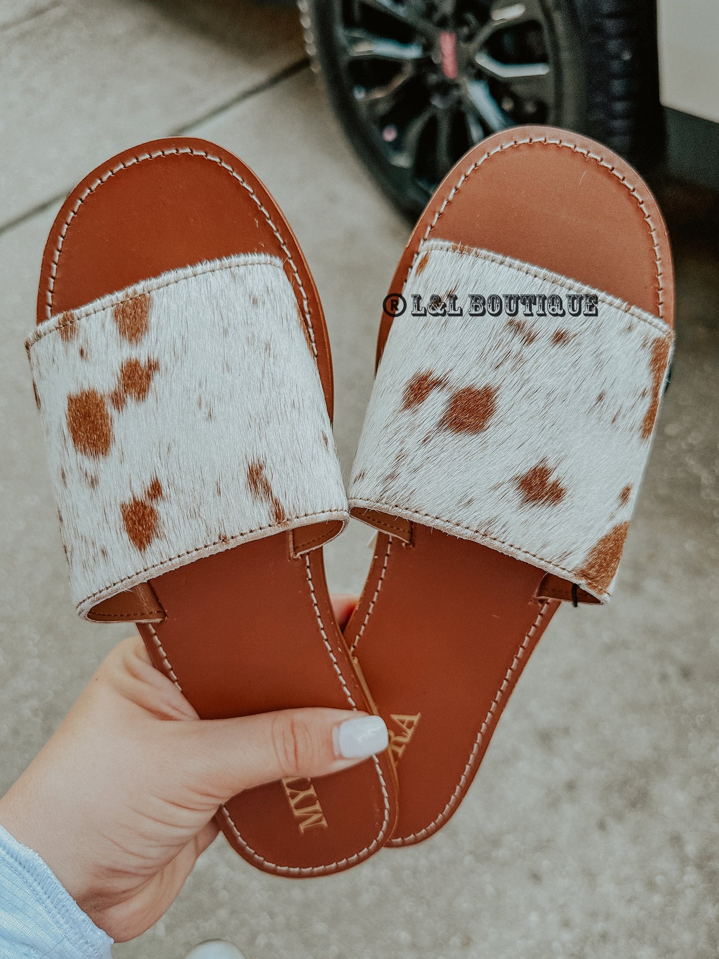 Kemma Cowhide Slides in Brown