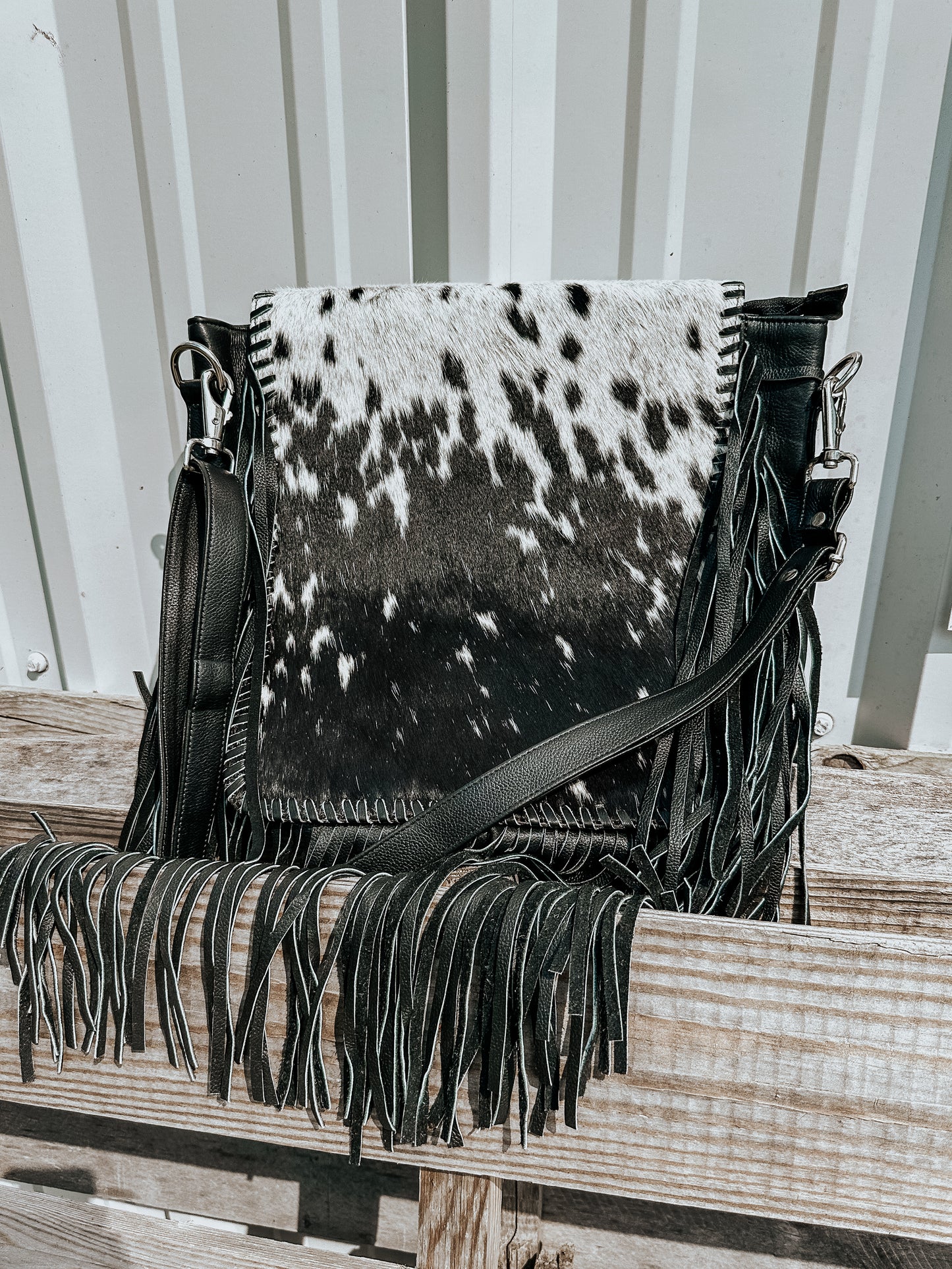 Chesapeak Cowhide Fringe Crossbody in Black