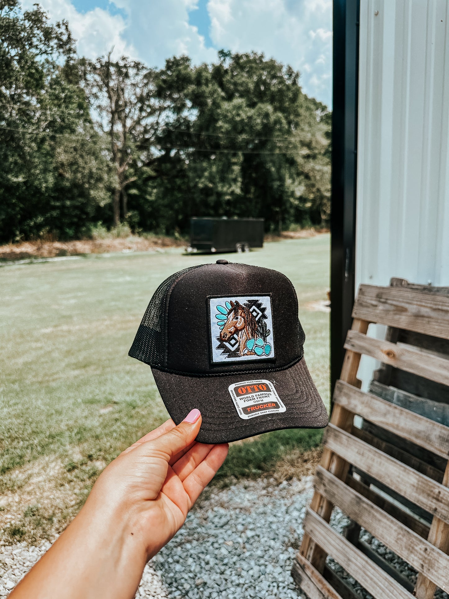 Turquoise Horse Patch Trucker Hat in Black