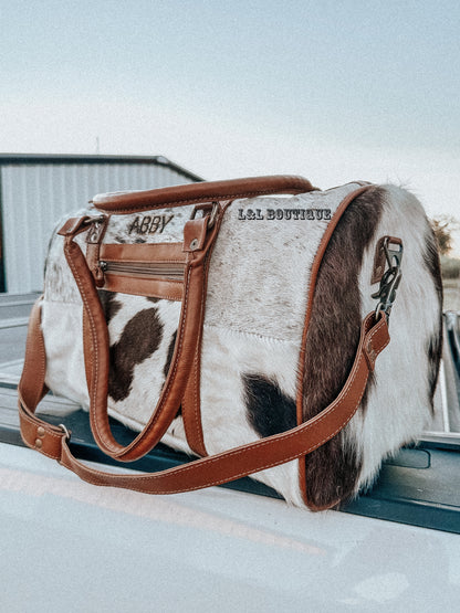 Onyx Traveler Cowhide Duffle Bag