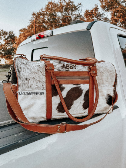 Onyx Traveler Cowhide Duffle Bag