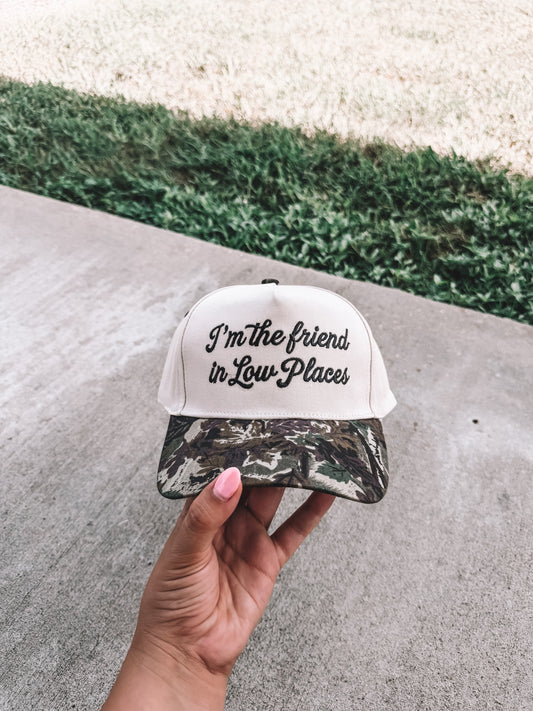 I’m The Friend In Low Places Trucker Hat - Camo