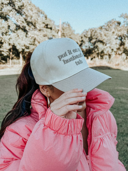 Husbands Tab Trucker Hat in Cream