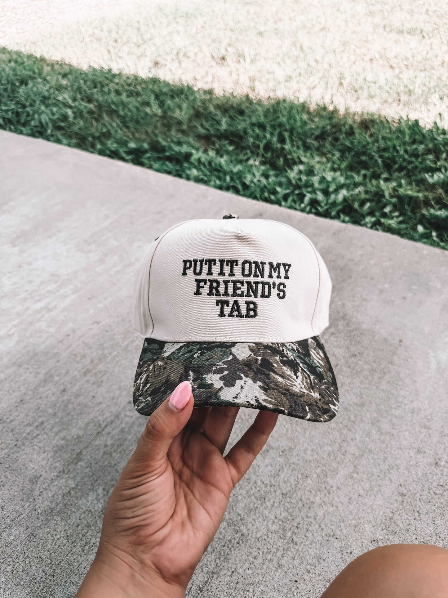 Put It On My Friends Tab Trucker Hat - Camo
