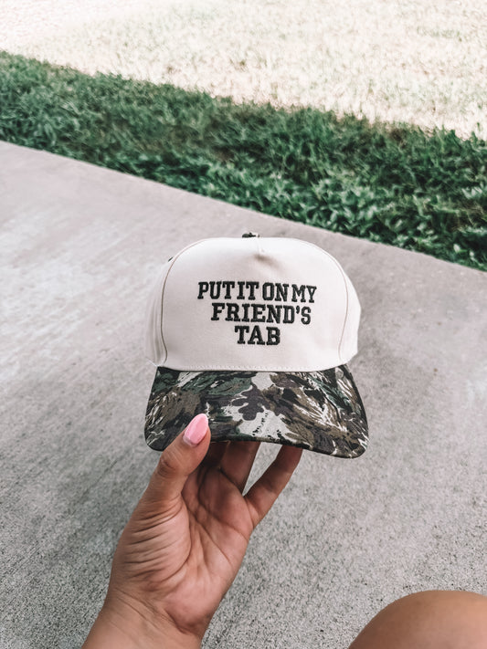 Put It On My Friends Tab Trucker Hat - Camo