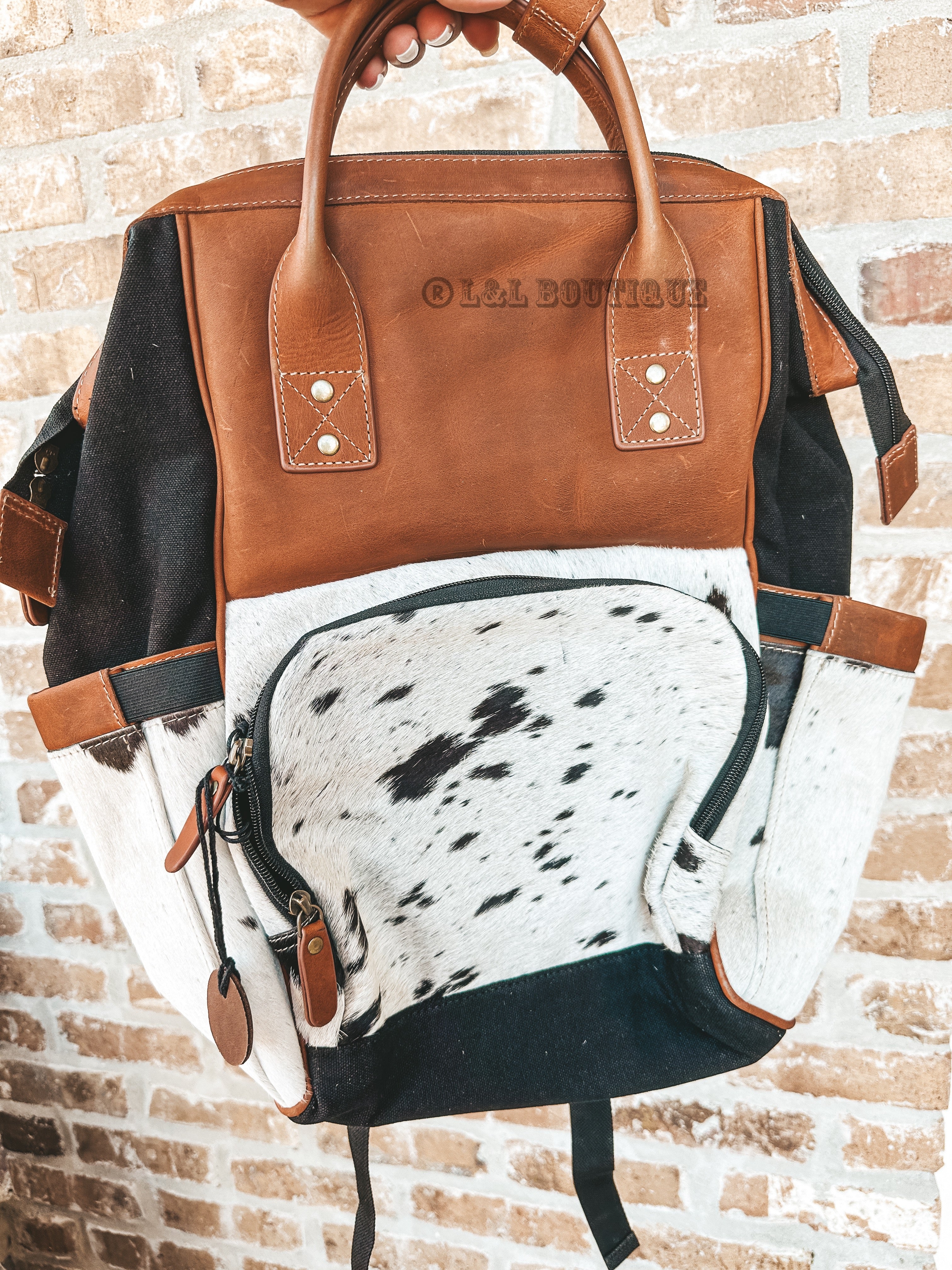 Cowhide discount diaper bag